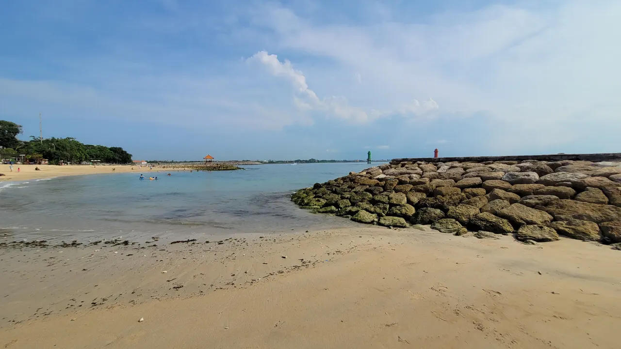 A view along Sanur Beach on the east coast of Bali, Indonesia.
